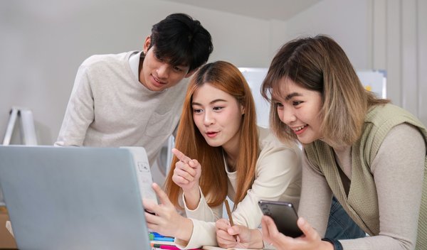 What are the steps to implement a real-time chat application using WebSockets and Django Channels?